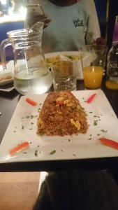 A mixed dish of seafood and fried rice in the Traditional Peruvian style. 